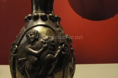 Photo of Sassanid Empire's Coins,Mosaics,Silver relief,Jewelry and seals,Pottery and stucco sculpture&Textiles. The Exhibition entitled Les Perses Sassanides, Fastes d'un Empire Oublié exhibits at the Cernuschi, Museum Paris.More than 200 items are presented at the exhibition and borrowed from the most prestigious international collections from museums in the United States, Europe and Iran testify of the diversity of this sumptuous art and of its various influences combining ancient Greek and authentic Persian traditions.The Kings court was equally sumptuous with grand parties given for princes and nobles of allied kingdoms. This ostentatious splendor encourages more "minor" arts. Silver dishes encrusted by gold coins featuring the King, Cups and Amphora's decorated by symbols related to Mazdean religion ( Pre-Islamic monotheistic religion) or shows dancers, musicians and jesters. Fine Crockery, rich silk, ceremonial jewel encrusted swords and gold or silver coins are displayed at the exhibition.