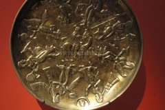 Photo of Sassanid Empire's Coins,Mosaics,Silver relief,Jewelry and seals,Pottery and stucco sculpture&Textiles. The Exhibition entitled Les Perses Sassanides, Fastes d'un Empire Oublié exhibits at the Cernuschi, Museum Paris.More than 200 items are presented at the exhibition and borrowed from the most prestigious international collections from museums in the United States, Europe and Iran testify of the diversity of this sumptuous art and of its various influences combining ancient Greek and authentic Persian traditions.The Kings court was equally sumptuous with grand parties given for princes and nobles of allied kingdoms. This ostentatious splendor encourages more "minor" arts. Silver dishes encrusted by gold coins featuring the King, Cups and Amphora's decorated by symbols related to Mazdean religion ( Pre-Islamic monotheistic religion) or shows dancers, musicians and jesters. Fine Crockery, rich silk, ceremonial jewel encrusted swords and gold or silver coins are displayed at the exhibition.