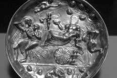 Photo of Sassanid Empire's Coins,Mosaics,Silver relief,Jewelry and seals,Pottery and stucco sculpture&Textiles. The Exhibition entitled Les Perses Sassanides, Fastes d'un Empire Oublié exhibits at the Cernuschi, Museum Paris.More than 200 items are presented at the exhibition and borrowed from the most prestigious international collections from museums in the United States, Europe and Iran testify of the diversity of this sumptuous art and of its various influences combining ancient Greek and authentic Persian traditions.The Kings court was equally sumptuous with grand parties given for princes and nobles of allied kingdoms. This ostentatious splendor encourages more "minor" arts. Silver dishes encrusted by gold coins featuring the King, Cups and Amphora's decorated by symbols related to Mazdean religion ( Pre-Islamic monotheistic religion) or shows dancers, musicians and jesters. Fine Crockery, rich silk, ceremonial jewel encrusted swords and gold or silver coins are displayed at the exhibition.