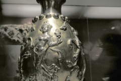 Photo of Sassanid Empire's Coins,Mosaics,Silver relief,Jewelry and seals,Pottery and stucco sculpture&Textiles. The Exhibition entitled Les Perses Sassanides, Fastes d'un Empire Oublié exhibits at the Cernuschi, Museum Paris.More than 200 items are presented at the exhibition and borrowed from the most prestigious international collections from museums in the United States, Europe and Iran testify of the diversity of this sumptuous art and of its various influences combining ancient Greek and authentic Persian traditions.The Kings court was equally sumptuous with grand parties given for princes and nobles of allied kingdoms. This ostentatious splendor encourages more "minor" arts. Silver dishes encrusted by gold coins featuring the King, Cups and Amphora's decorated by symbols related to Mazdean religion ( Pre-Islamic monotheistic religion) or shows dancers, musicians and jesters. Fine Crockery, rich silk, ceremonial jewel encrusted swords and gold or silver coins are displayed at the exhibition.