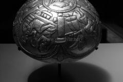 Photo of Sassanid Empire's Coins,Mosaics,Silver relief,Jewelry and seals,Pottery and stucco sculpture&Textiles. The Exhibition entitled Les Perses Sassanides, Fastes d'un Empire Oublié exhibits at the Cernuschi, Museum Paris.More than 200 items are presented at the exhibition and borrowed from the most prestigious international collections from museums in the United States, Europe and Iran testify of the diversity of this sumptuous art and of its various influences combining ancient Greek and authentic Persian traditions.The Kings court was equally sumptuous with grand parties given for princes and nobles of allied kingdoms. This ostentatious splendor encourages more "minor" arts. Silver dishes encrusted by gold coins featuring the King, Cups and Amphora's decorated by symbols related to Mazdean religion ( Pre-Islamic monotheistic religion) or shows dancers, musicians and jesters. Fine Crockery, rich silk, ceremonial jewel encrusted swords and gold or silver coins are displayed at the exhibition.