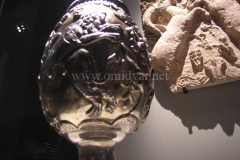 Photo of Sassanid Empire's Coins,Mosaics,Silver relief,Jewelry and seals,Pottery and stucco sculpture&Textiles. The Exhibition entitled Les Perses Sassanides, Fastes d'un Empire Oublié exhibits at the Cernuschi, Museum Paris.More than 200 items are presented at the exhibition and borrowed from the most prestigious international collections from museums in the United States, Europe and Iran testify of the diversity of this sumptuous art and of its various influences combining ancient Greek and authentic Persian traditions.The Kings court was equally sumptuous with grand parties given for princes and nobles of allied kingdoms. This ostentatious splendor encourages more "minor" arts. Silver dishes encrusted by gold coins featuring the King, Cups and Amphora's decorated by symbols related to Mazdean religion ( Pre-Islamic monotheistic religion) or shows dancers, musicians and jesters. Fine Crockery, rich silk, ceremonial jewel encrusted swords and gold or silver coins are displayed at the exhibition.